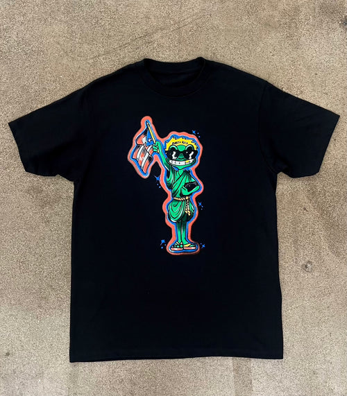 Estatua De Coqui Tee